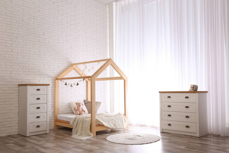 s room interior with cute wooden bed