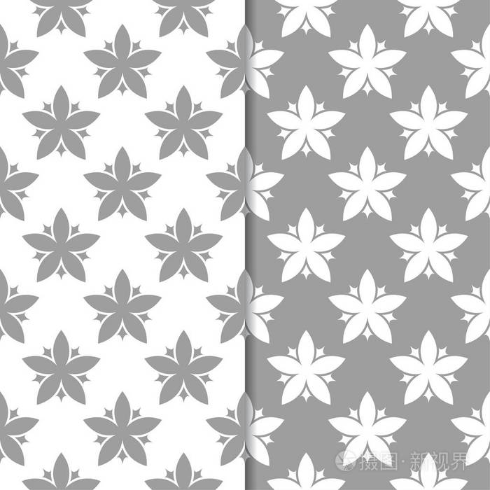 白色和灰色的花背景。 纺织品和壁纸的无缝图案集