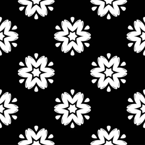 黑色背景上的白色花饰。 纺织品和壁纸的无缝图案