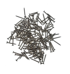 一堆钉子一堆白色的螺丝照片