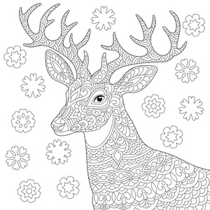 圣诞驯鹿和老式雪花.自由素描与涂鸦和禅宗元素.照片