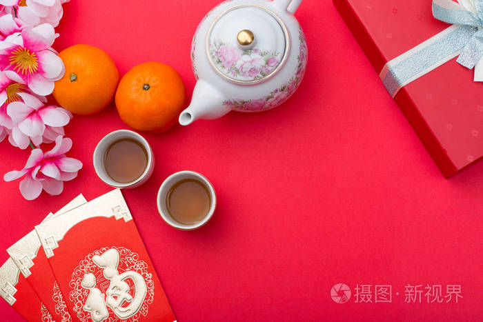 以红色为主题的橘红色花包装饰中国新年节日 汉字寓意幸福 吉祥 利润丰厚照片 正版商用图片177ecp 摄图新视界
