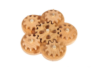 s sorter with small wooden details in the form of gears on a whi
