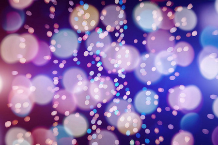 节日背景与自然波克和明亮的金色灯光。 复古魔术背景与彩色波克。 春季 