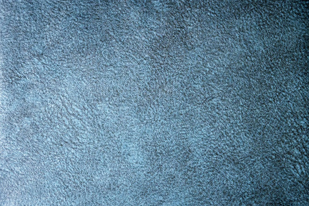 纹理背景表面的纺织内饰家具特写。灰色蓝色面料结构