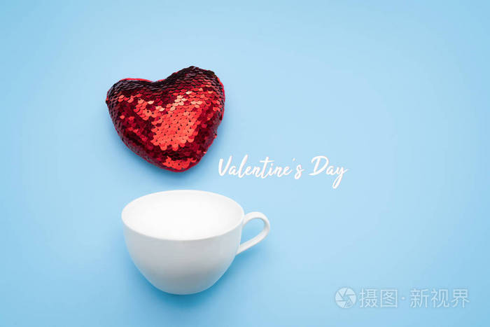 s day concept. red heart with white coffee cup on blue backgroun