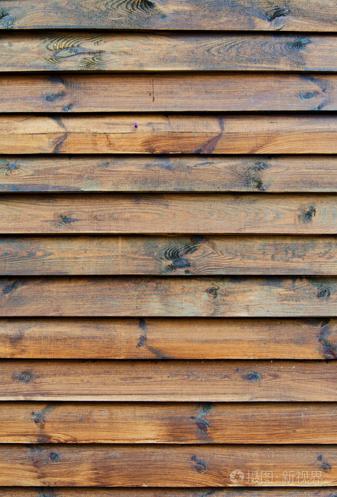 天然结木栅栏的背景木制的纹理