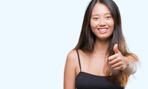 赞许的表情看着相机,显示出成功.照片