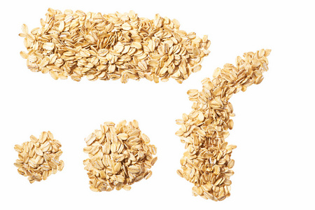 干燥的生燕麦片分离在白色背景上。 卷平的谷物。 燕麦片大疱为背景