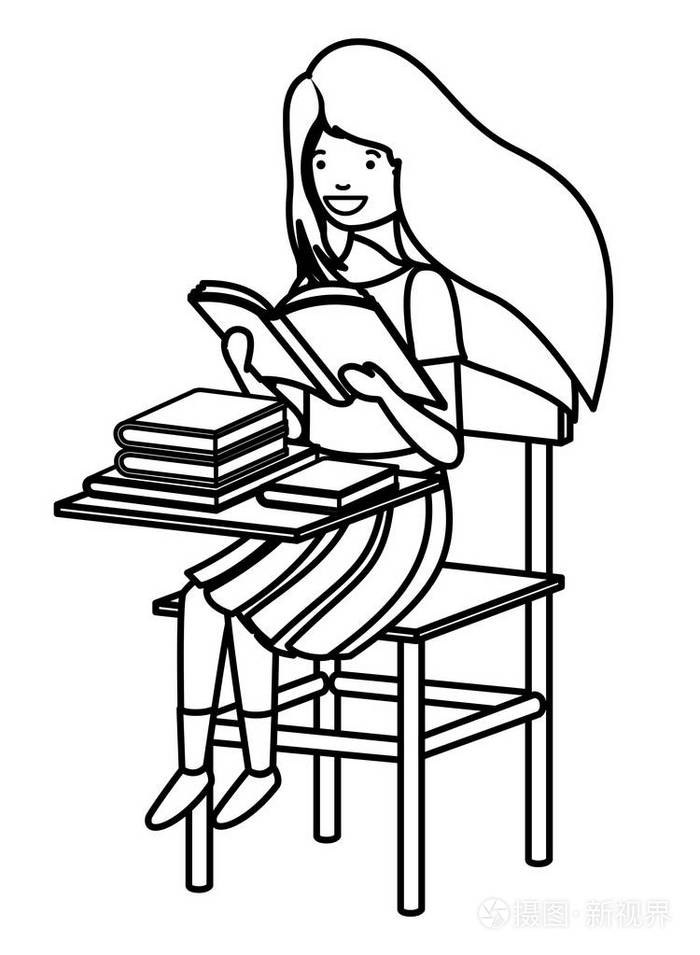 在书桌上读书的年轻学生女孩