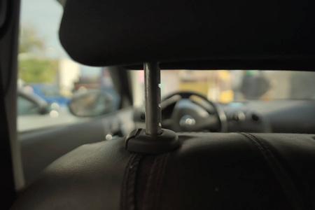 s seat and closeup head restraint. Shallow depth of field compo