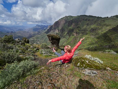 s edge admiring landscape, Gran Canaria, Spain