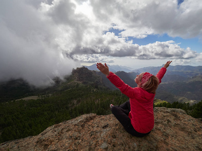 s edge admiring landscape, Gran Canaria, Spain