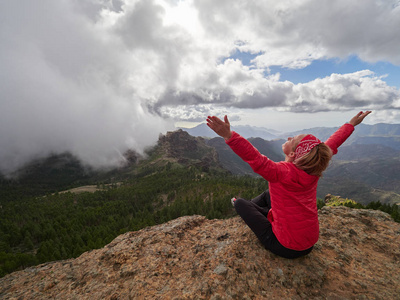 s edge admiring landscape, Gran Canaria, Spain