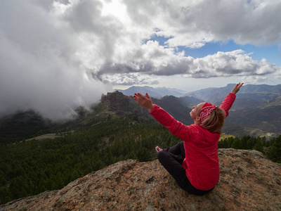 s edge admiring landscape, Gran Canaria, Spain