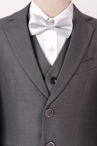 s grey jacket suit with shirt and bow tie on white background.