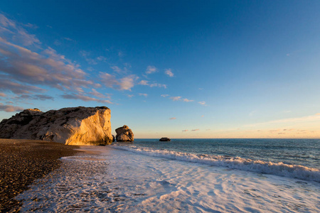 s rock on stone beach during susnet. Landscape taken on Cyprus i