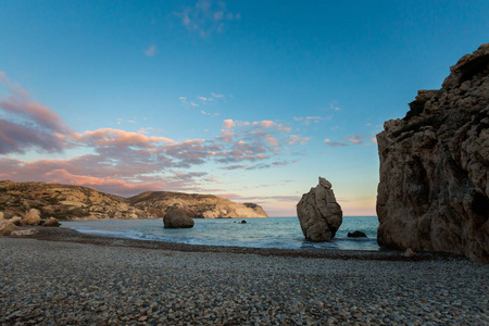 s rock on stone beach during susnet. Landscape taken on Cyprus i