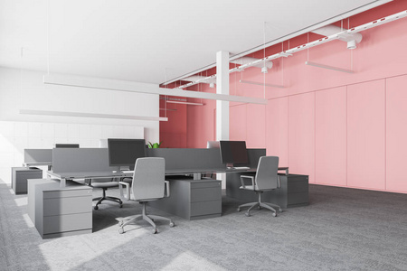 现代办公场所，白色和粉红色的墙壁，地毯地板，一排排灰色的电脑桌子，椅子和储物柜靠近墙壁。 3D渲染