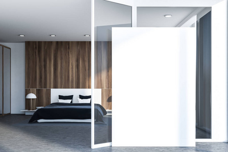 卧室内部有白色和木制墙壁，混凝土地板，白色主床，灰色毯子和垂直海报站在地板上。 3D渲染模拟