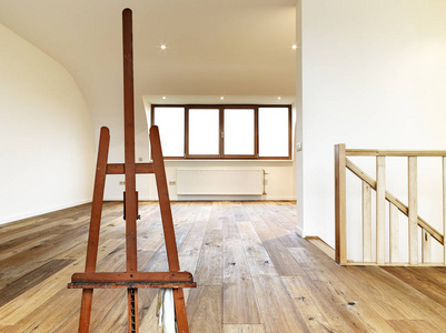 s easel empty in a modern interior with wooden floor