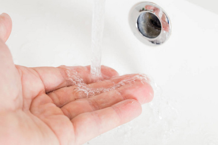 s hand closeup. Washing hands.