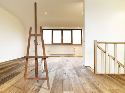 s easel empty in a modern interior with wooden floor