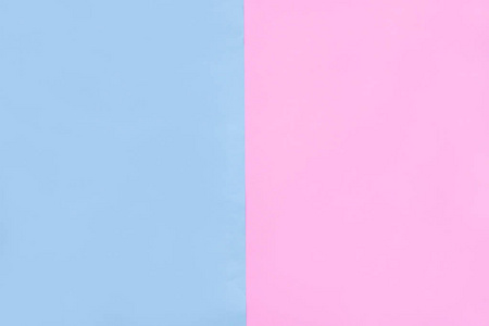 美丽的粉红色和蓝色粉彩纸纹理空平。 趋势可爱的颜色，最小的图案或背景概念。 抽象淡蓝色和粉红色的软纸背景与顶部视图复制空间。