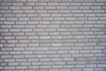 粗糙的灰砖块混凝土墙背景
