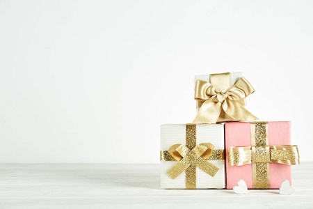 s day concept. Close up composition with presents wrapped in col