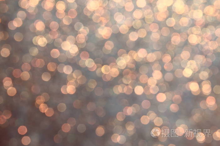 节日的光辉背景. 圣诞灯光背景. 离焦背景与闪烁的星星.