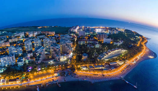 seye view. The lights of the promenade are reflected in the smo