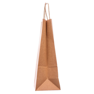 一个空的棕色纸袋。回收纸购物袋隔离在白色背景。