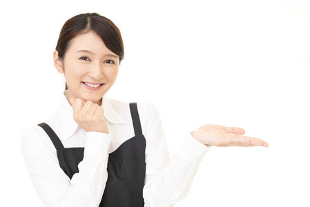 亚洲女服务员的手掌上有东西照片