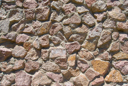 装饰墙装饰石. 红色花岗岩的正面. 石材砌块照片