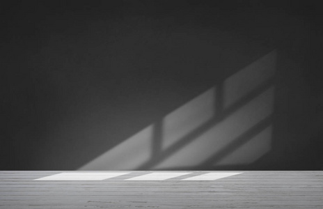 有混凝土地板的空房间里的黑墙照片