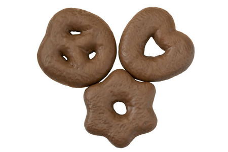 三个巧克力姜饼在不同的形状，孤立的白色背景。