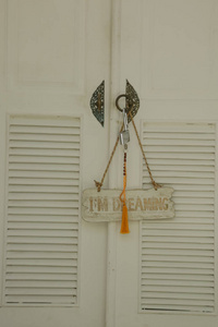 m dreaming sign on the door