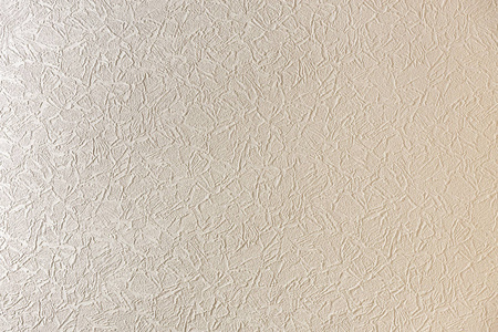 白色浅灰色复制空间背景的天然水泥或石浆灰墙，平坦的表面或布皱纹纹理作为复古图案。 复古或灰色背景。