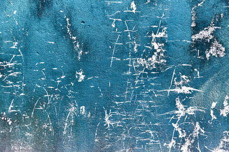 古老的蓝色破旧的水泥墙。纹理