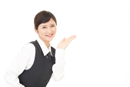 上有东西商人用手指指着年轻的商业女性指向向上女商人给我指路一个