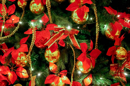  red colorful balls on Green Christmas tree background decoratio