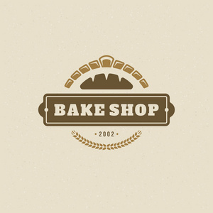 烘焙徽章或标签复古矢量插图。 面包和烤箱的轮廓。 印刷标志设计。