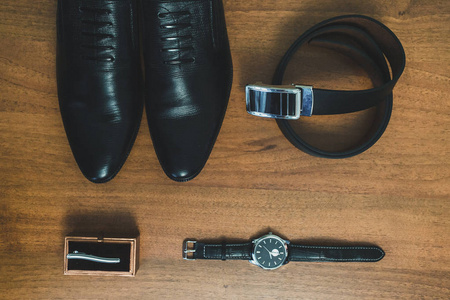 s accessories watch, tie, belt, shoes top view.