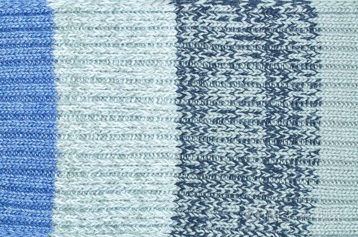 无缝米黄色针织面料纹理与辫子毛衣重复机器编织纹理米色针织背景