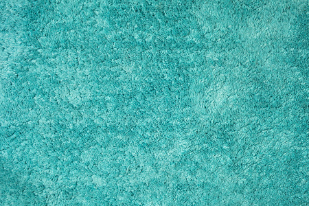 由棉毛制成的绿松石地毯的质地细节