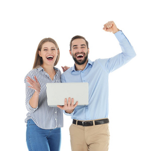 情绪激动的年轻人用笔记本电脑在白色背景下庆祝胜利