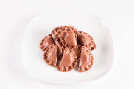 波兰奶酪传统的波兰饺子,叫做皮罗吉巧克力,有奶酪味照片