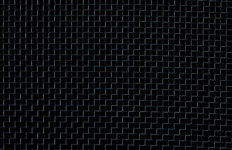 黑色背景上的纹理金属网格照片