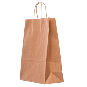 一个空的棕色纸袋。 回收纸购物袋隔离在白色背景上。